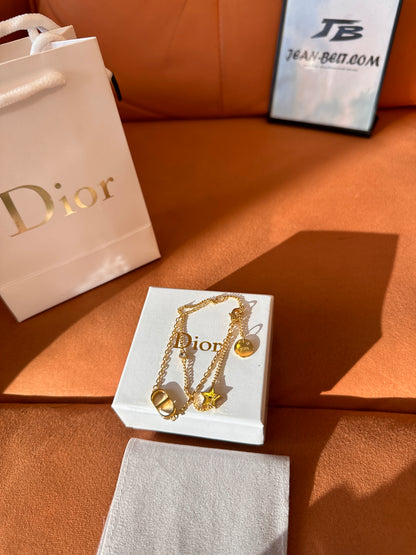 Dior gold-finish CD chain bracelet with star charm
