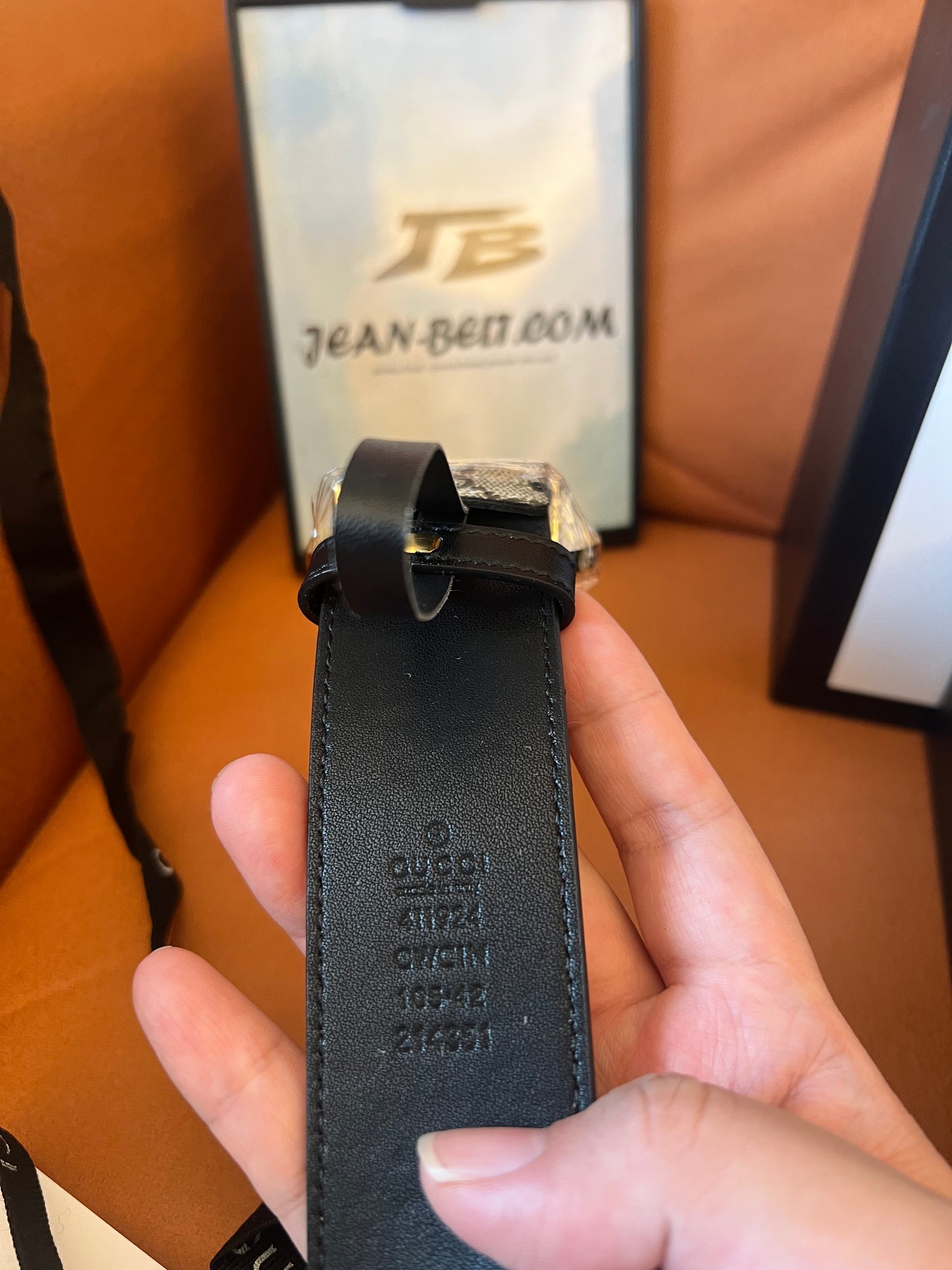 Cinturón Gucci GG Supreme con hebilla de doble G dorada