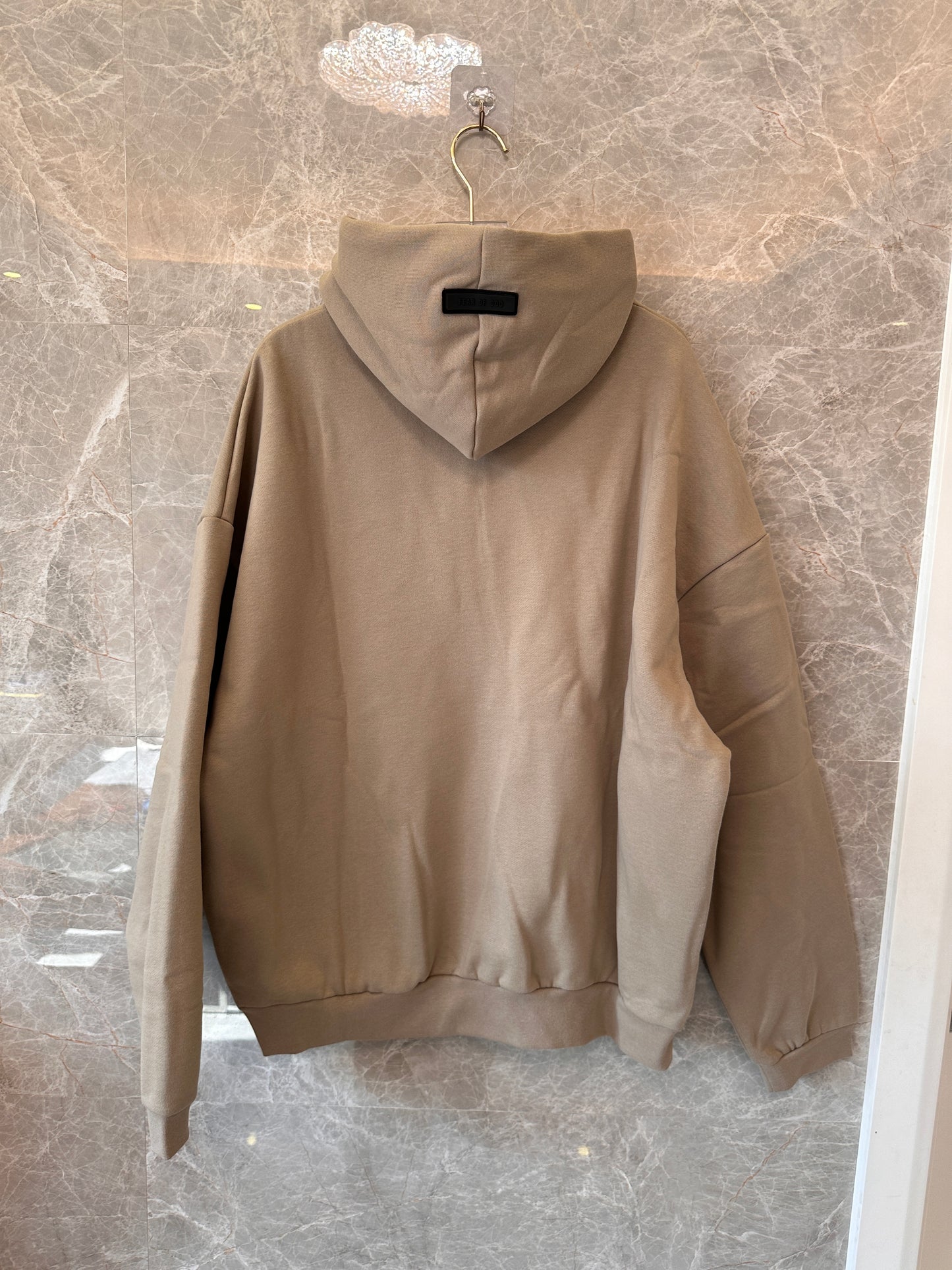Moletom oversized Fear of God Essentials em tom taupe