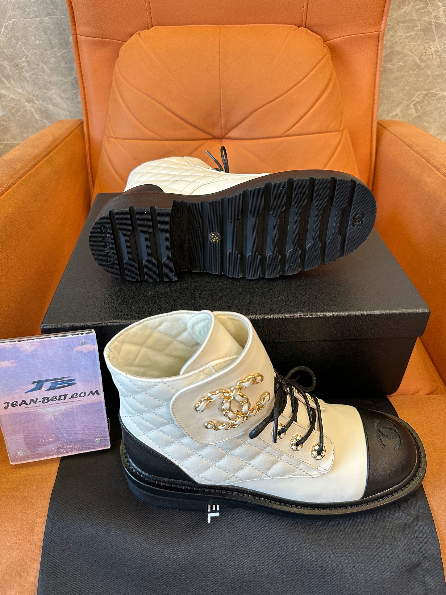 Chanel Chain Embellished Quilted Leather Ankle Boots – White & Black
