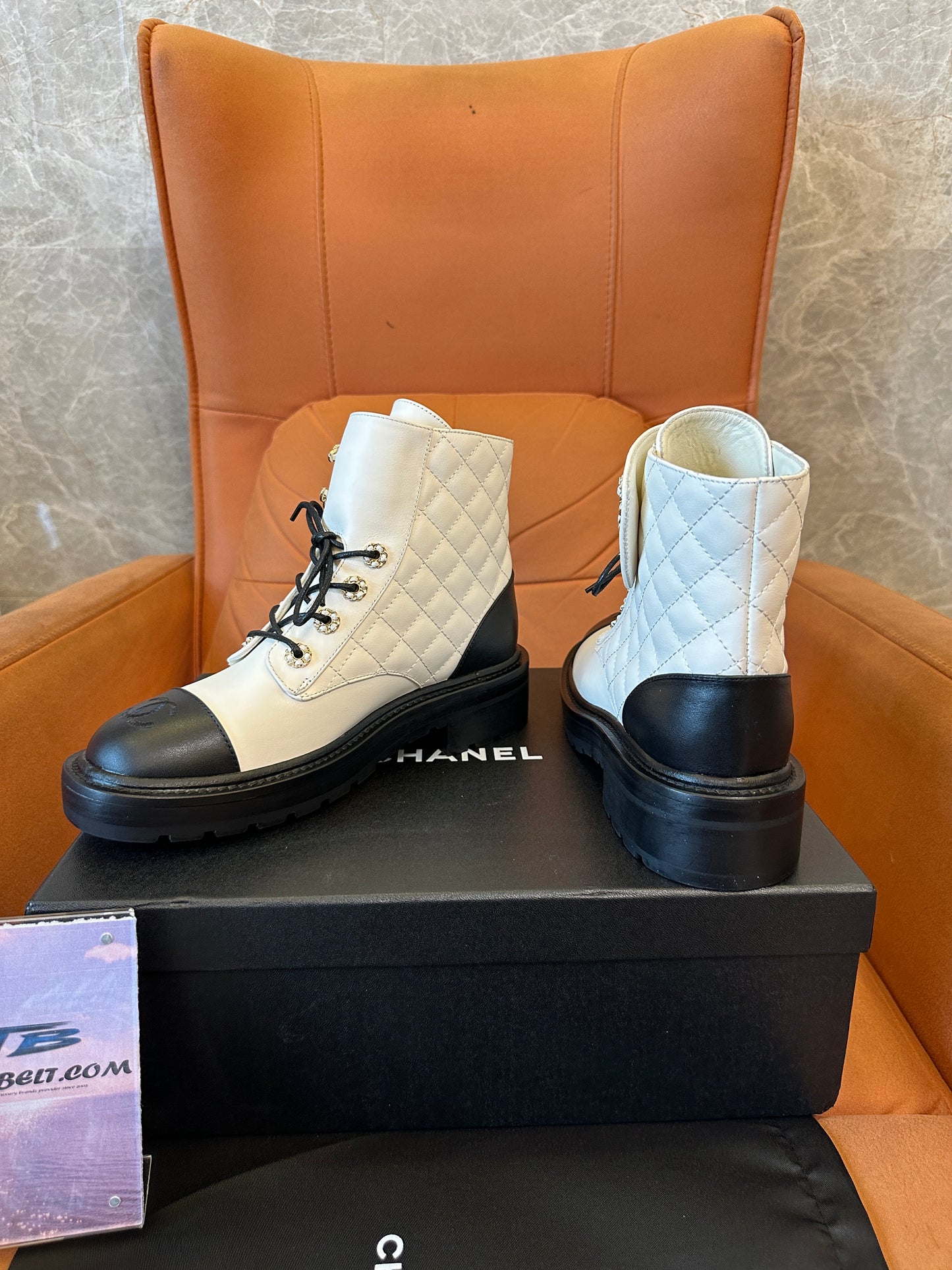 Chanel Chain Embellished Quilted Leather Ankle Boots – White & Black