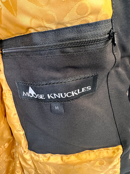 Parka Moose Knuckles série dourada – jaqueta preta de plumas