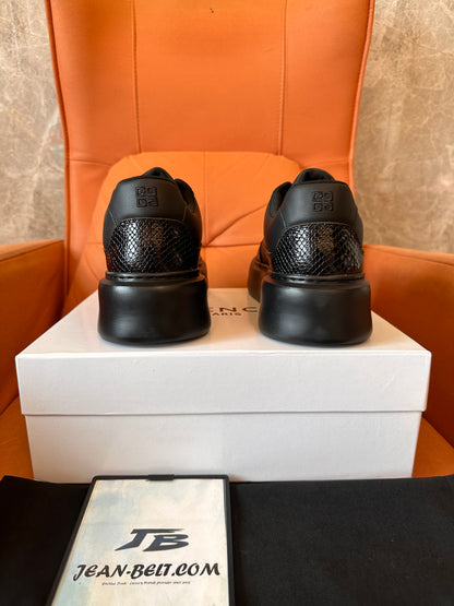 Zapatillas Givenchy de piel negra con detalle de piel de serpiente y suela de plataforma