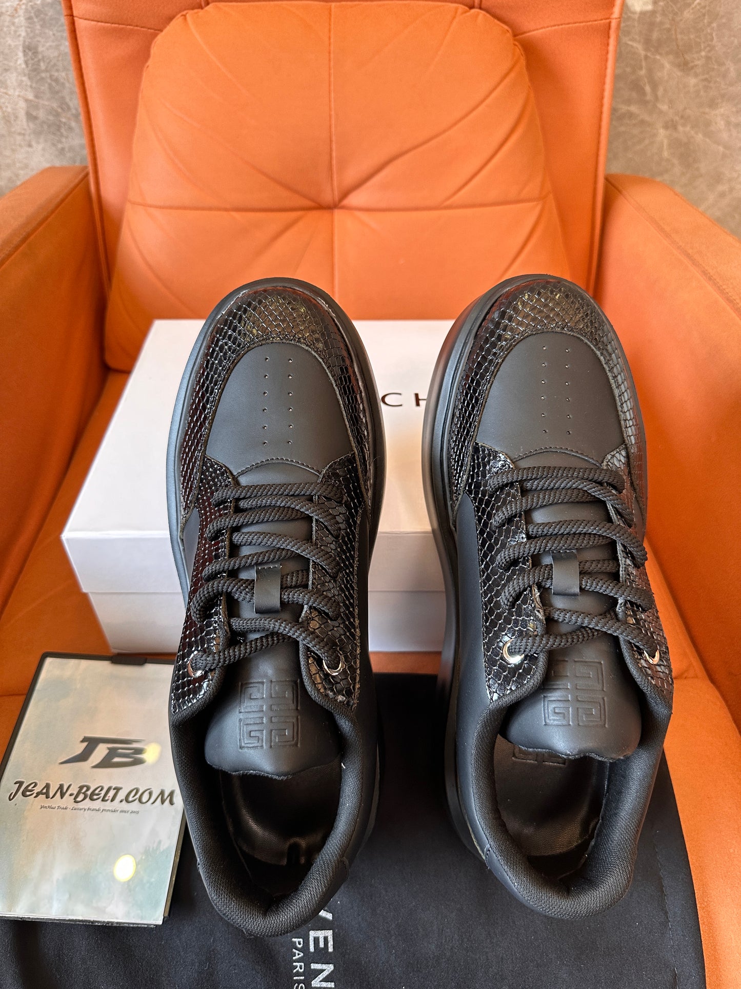 Zapatillas Givenchy de piel negra con detalle de piel de serpiente y suela de plataforma