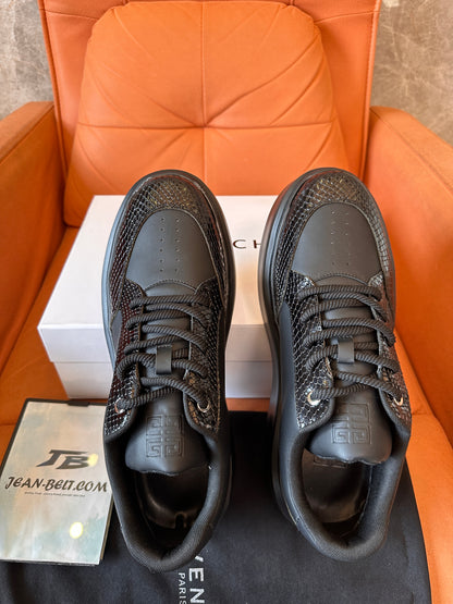 Zapatillas Givenchy de piel negra con detalle de piel de serpiente y suela de plataforma