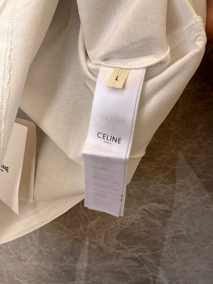 Camisola blanca de Celine Paris con ribete de lentejuelas negras