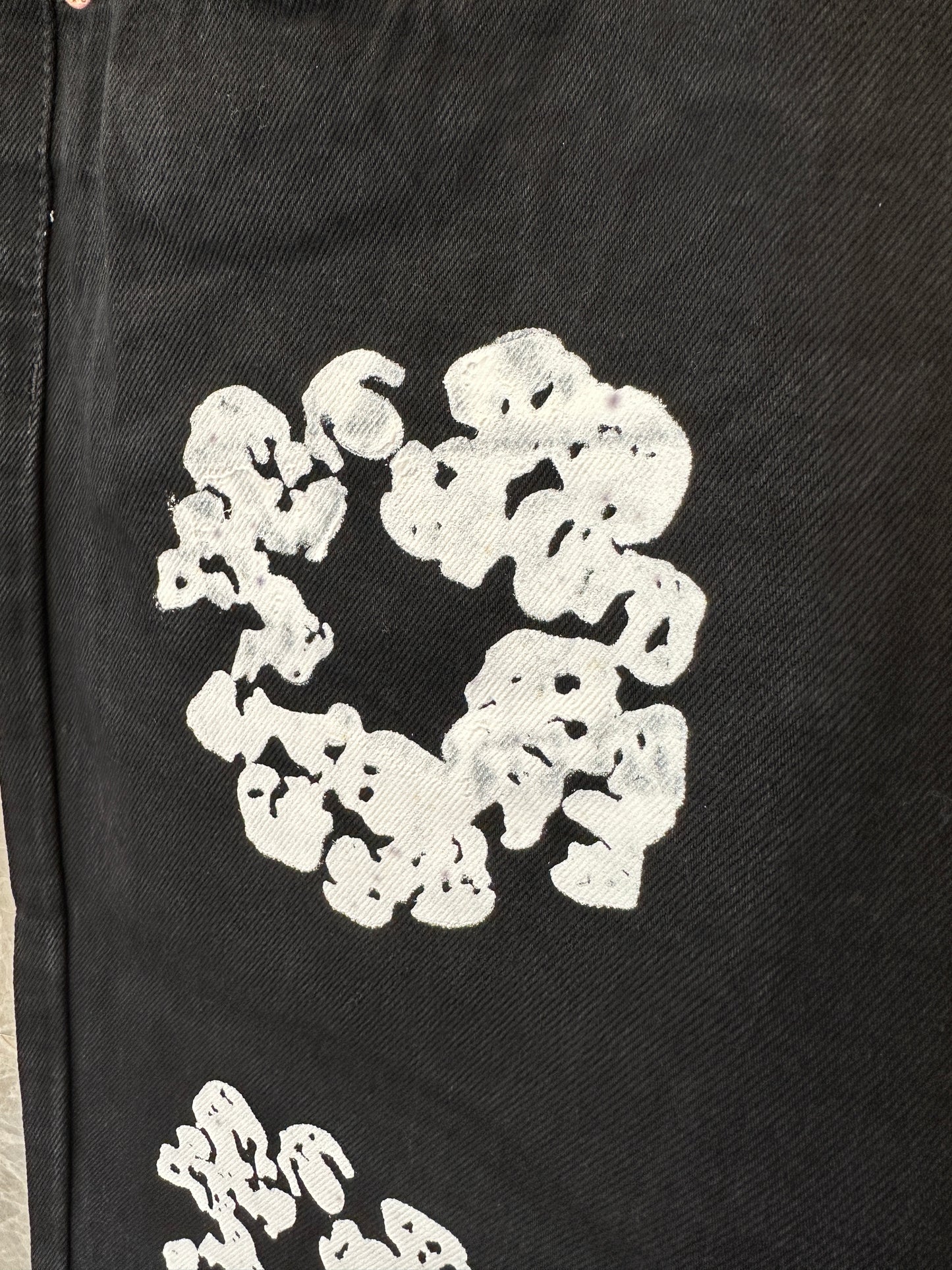Levi’s × Denim Tears 501 Black Cotton Wreath Printed Jeans