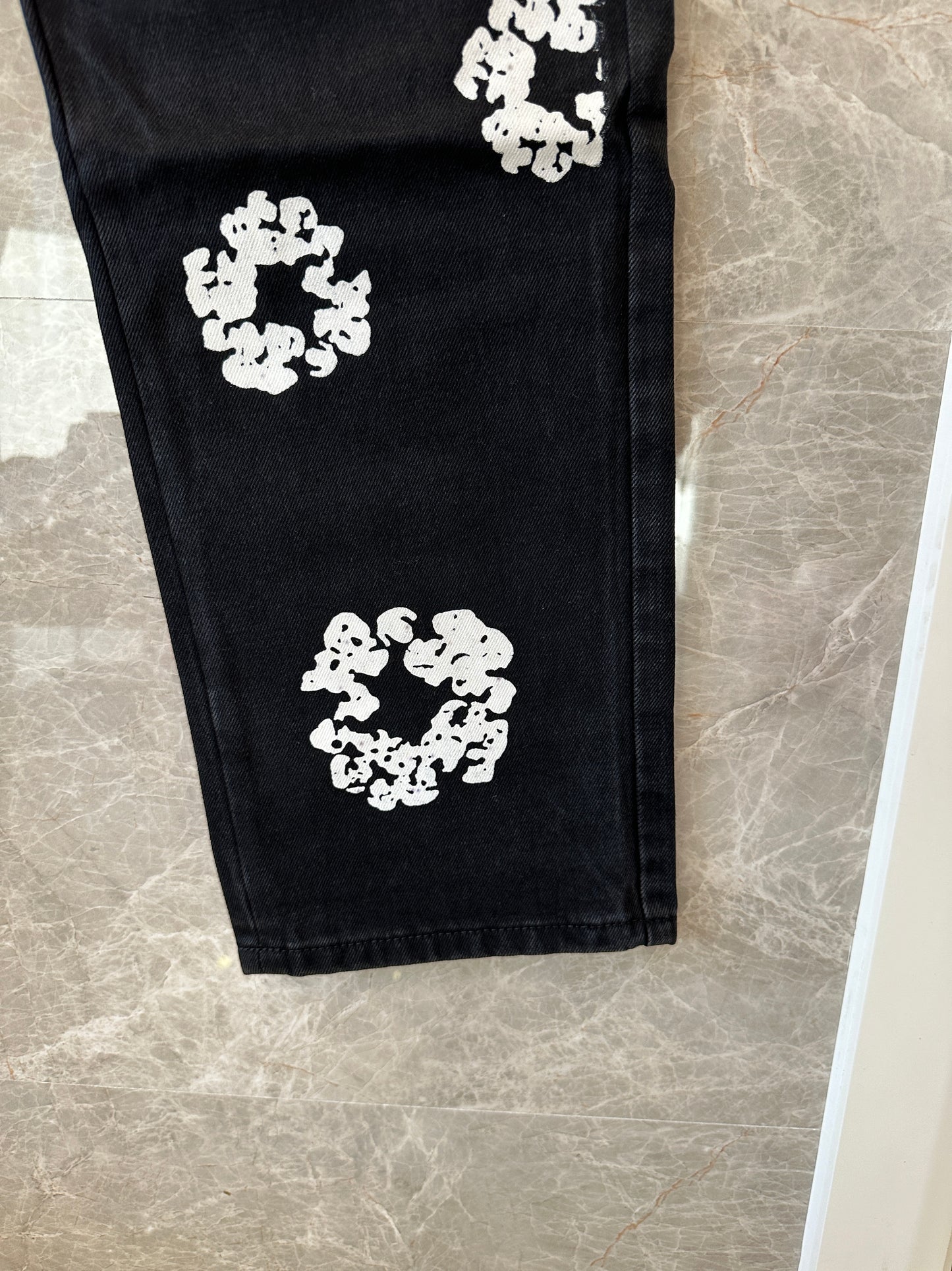 Levi’s × Denim Tears 501 Black Cotton Wreath Printed Jeans