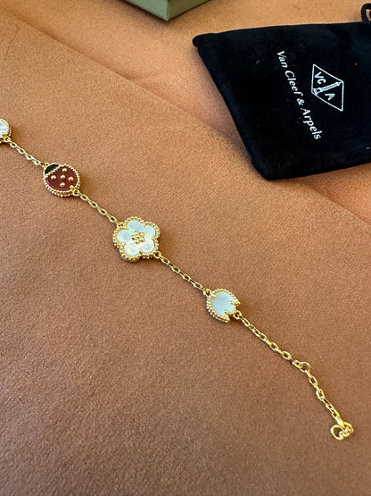 Van Cleef & Arpels Lucky Spring Bracelet – 18K Yellow Gold, Mother of Pearl & Carnelian