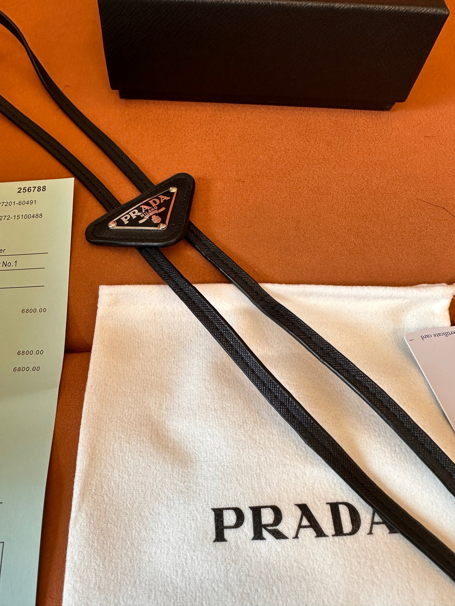 Prada Logo Plaque Leather Bolo Tie – Western-Inspired Accessory