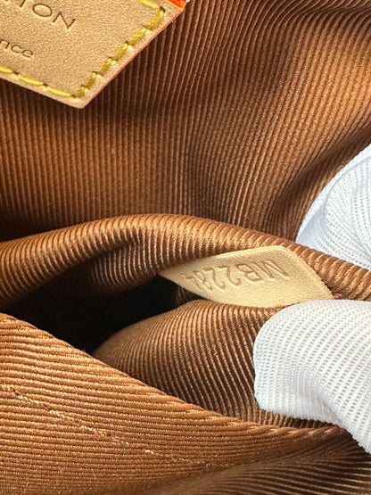 Louis Vuitton Montsouris Backpack – Monogram Canvas with Natural Leather Trim