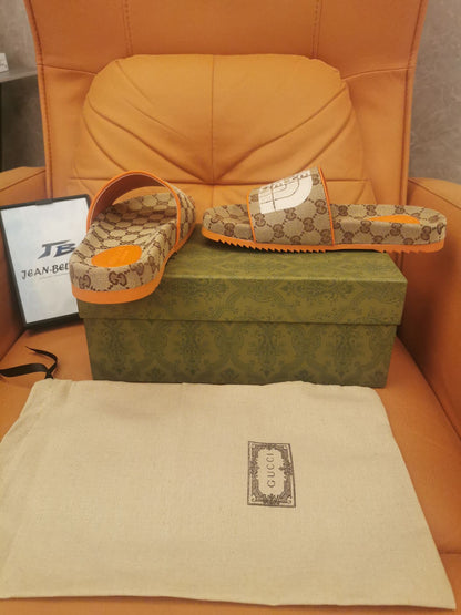 Gucci Slide x The North Face bege laranja monograma