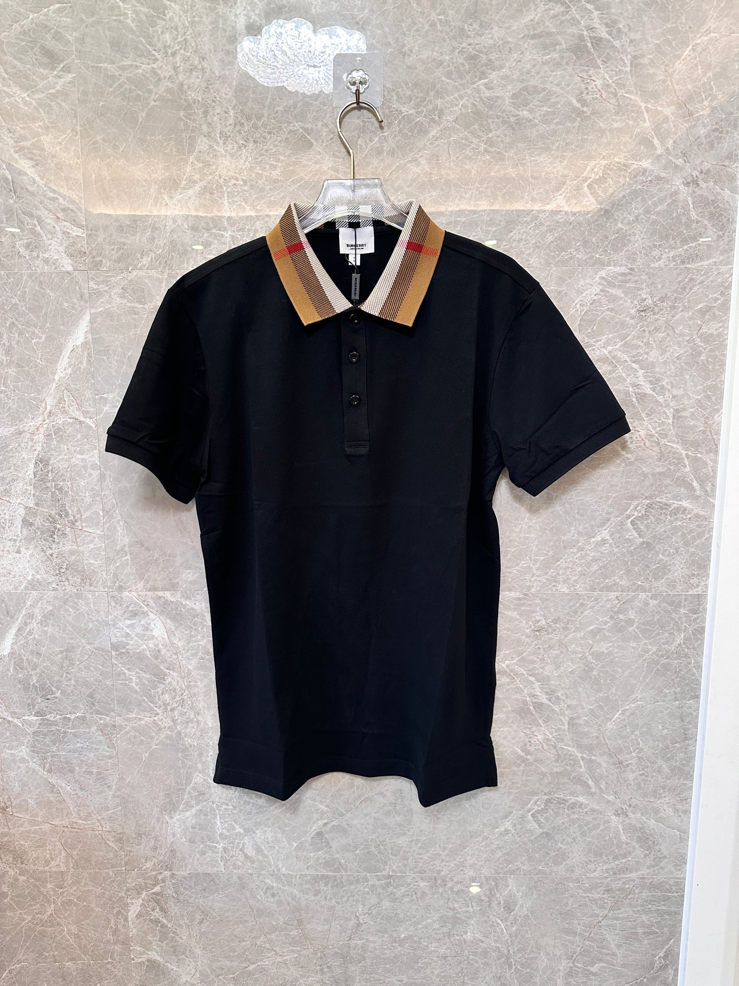 Polo de algodón Burberry con cuello a cuadros