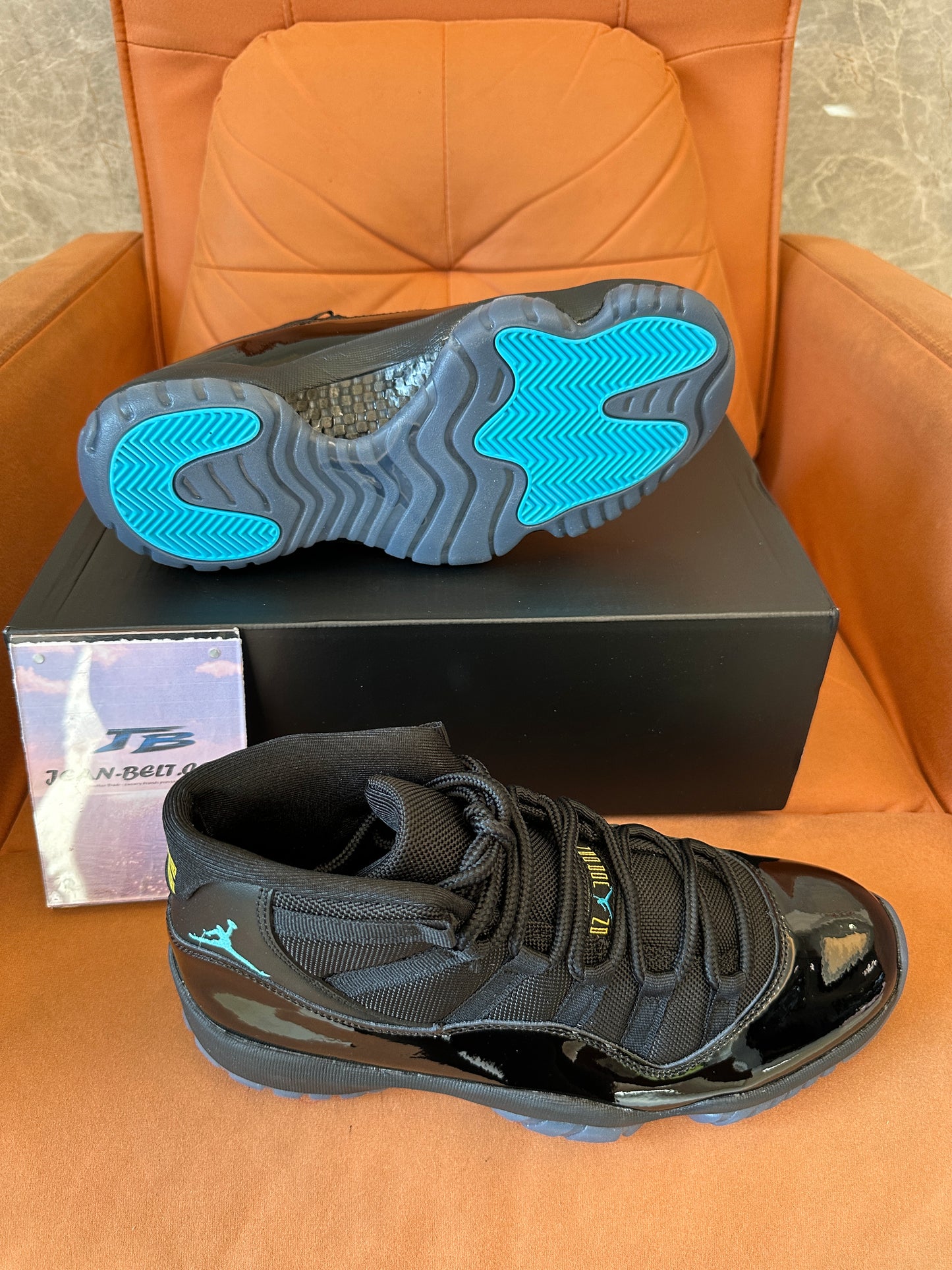 Air Jordan 11 Retro “Gamma Blue” Black Patent Leather Sneakers
