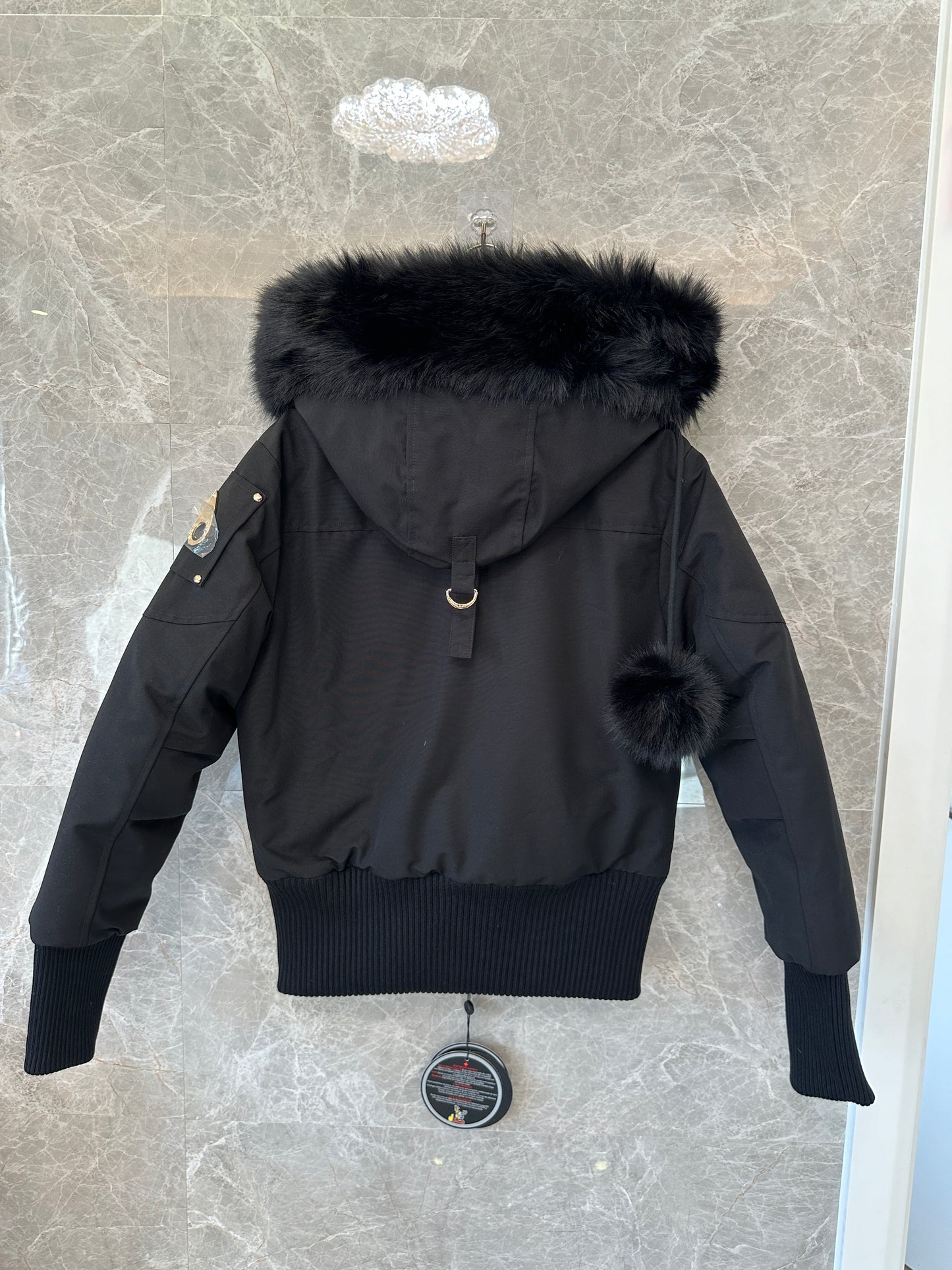 Moose Knuckles Women’s Short Down Jacket with Fur Hood – Black