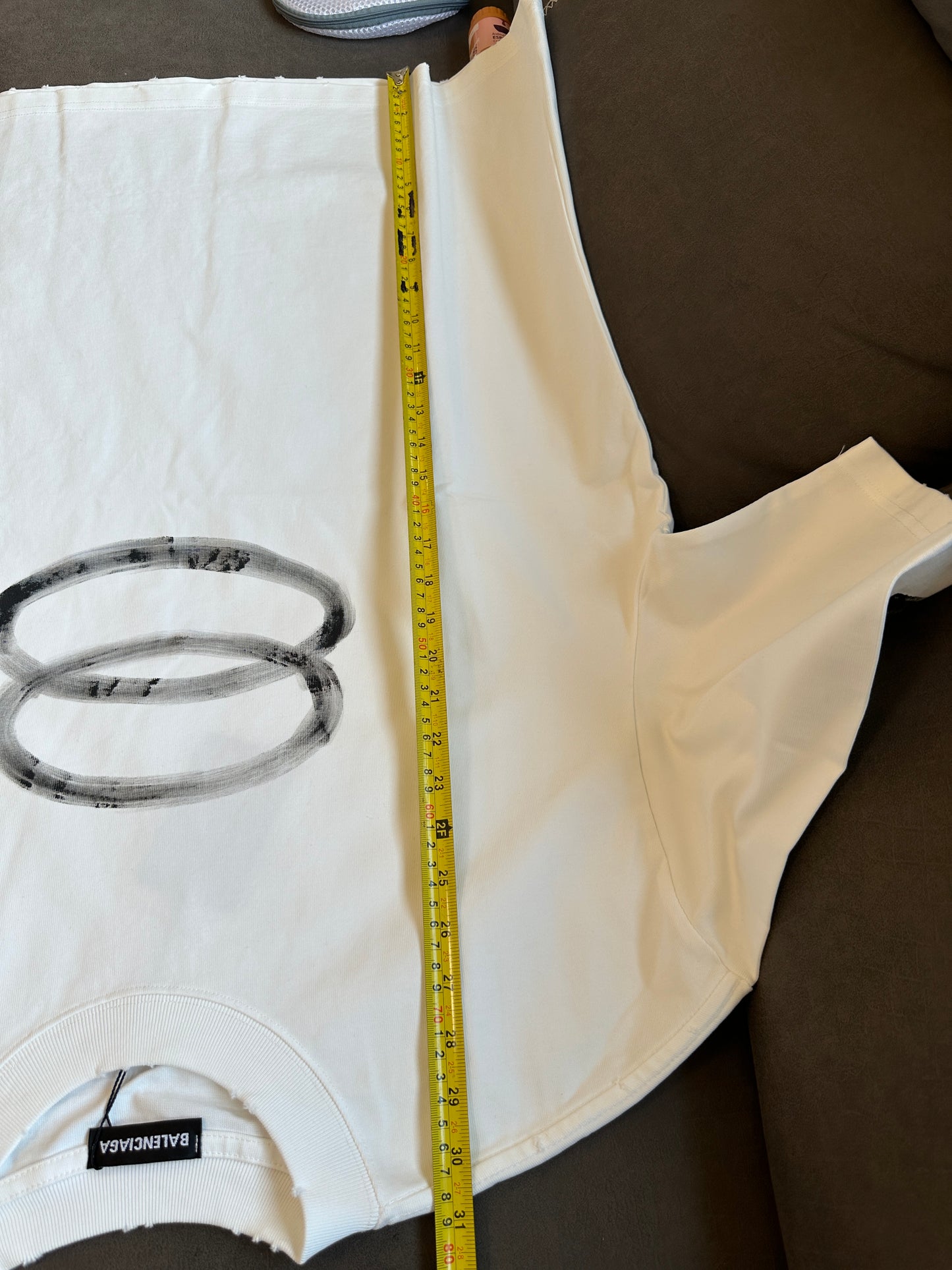 Balenciaga Oversized Graffiti Logo T-shirt – White with Brushstroke Print