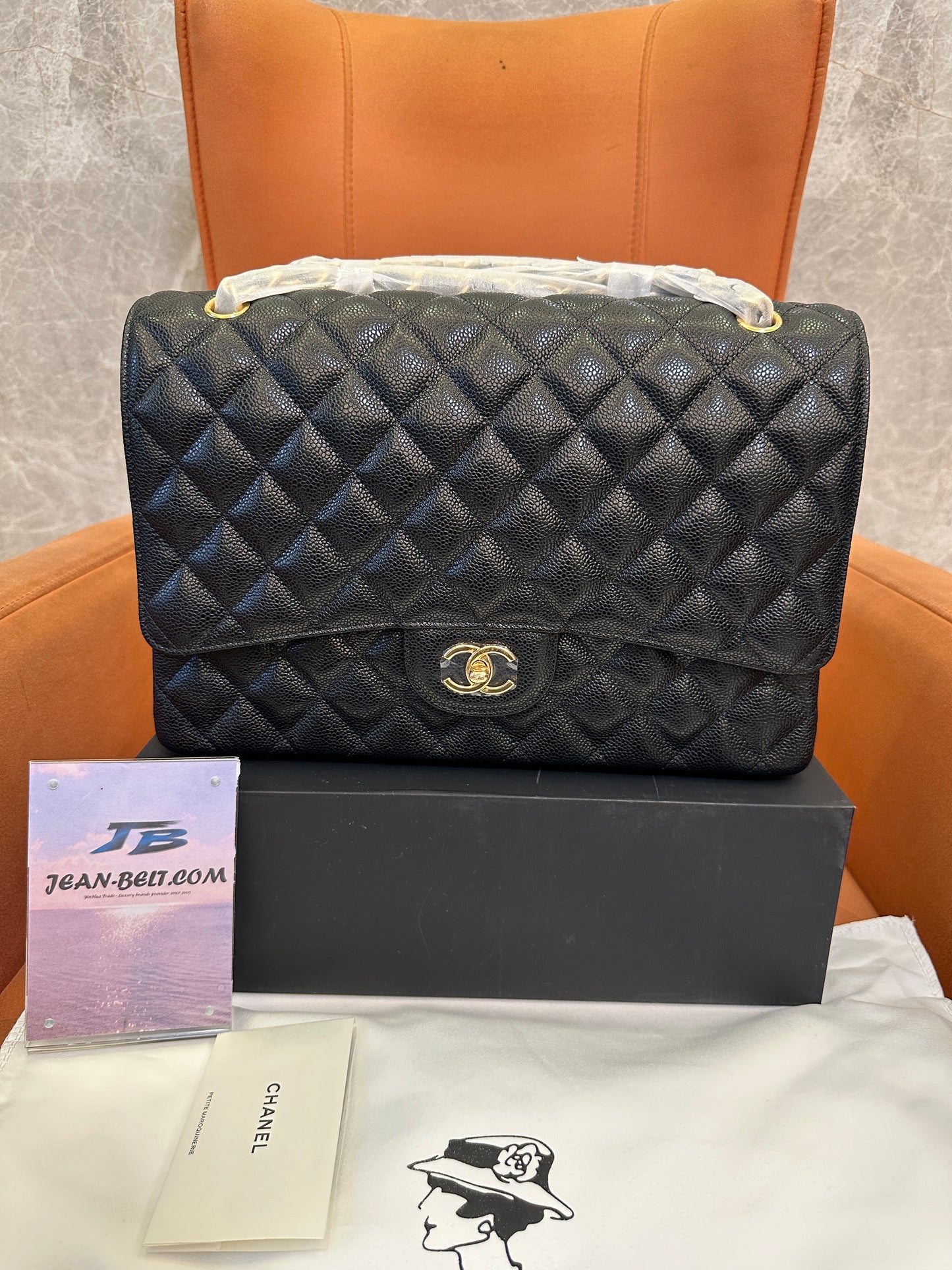 Chanel Classic Flap Bag Black Caviar Leather with Gold Hardware