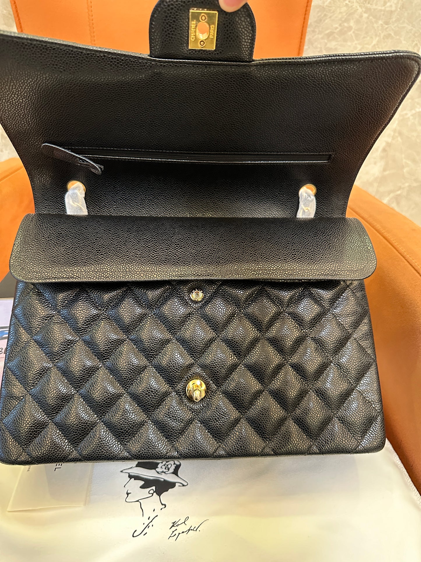 Chanel Classic Flap Bag Black Caviar Leather with Gold Hardware