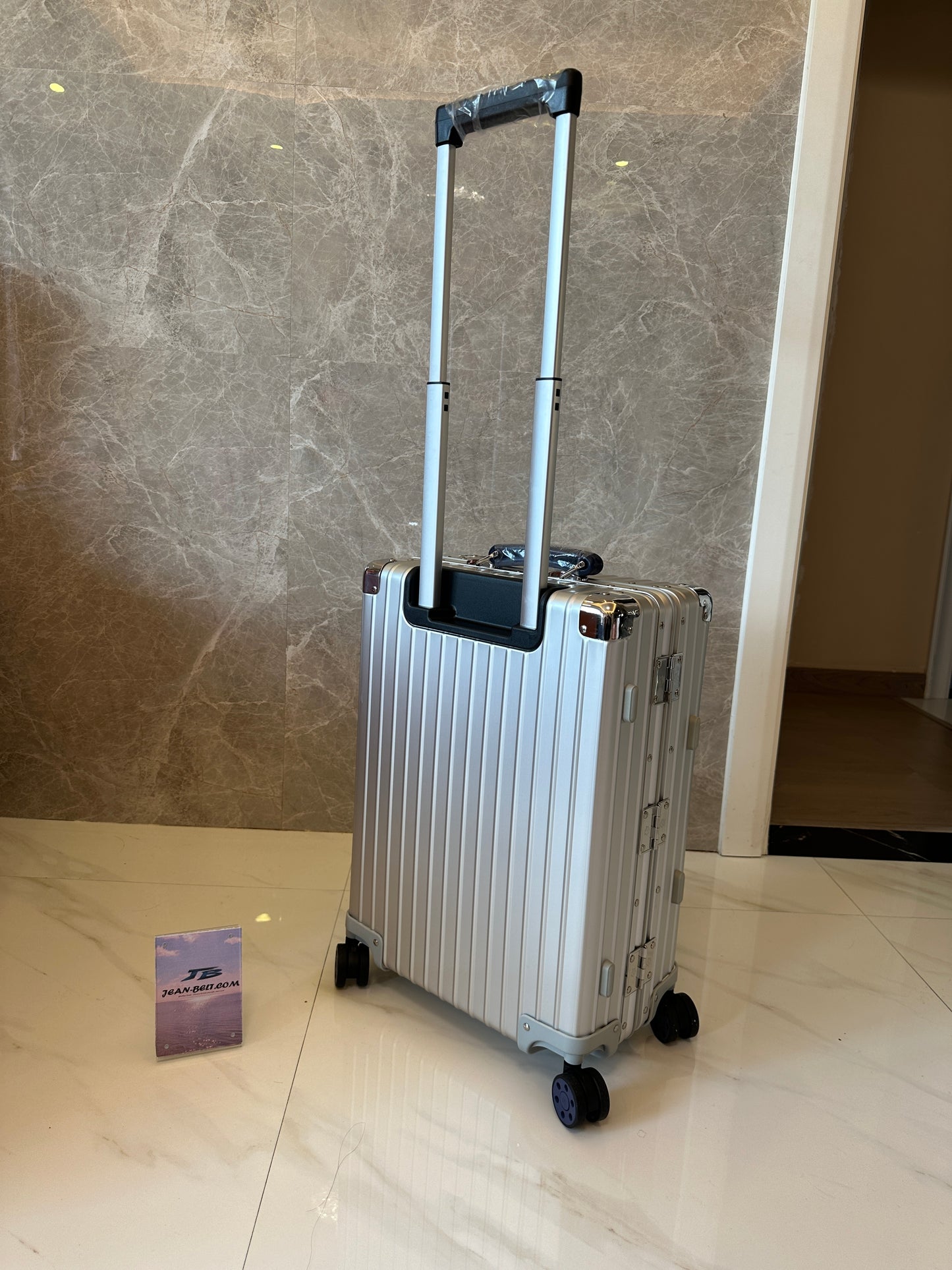 RIMOWA Silver Spinner Suitcase with TSA Lock
