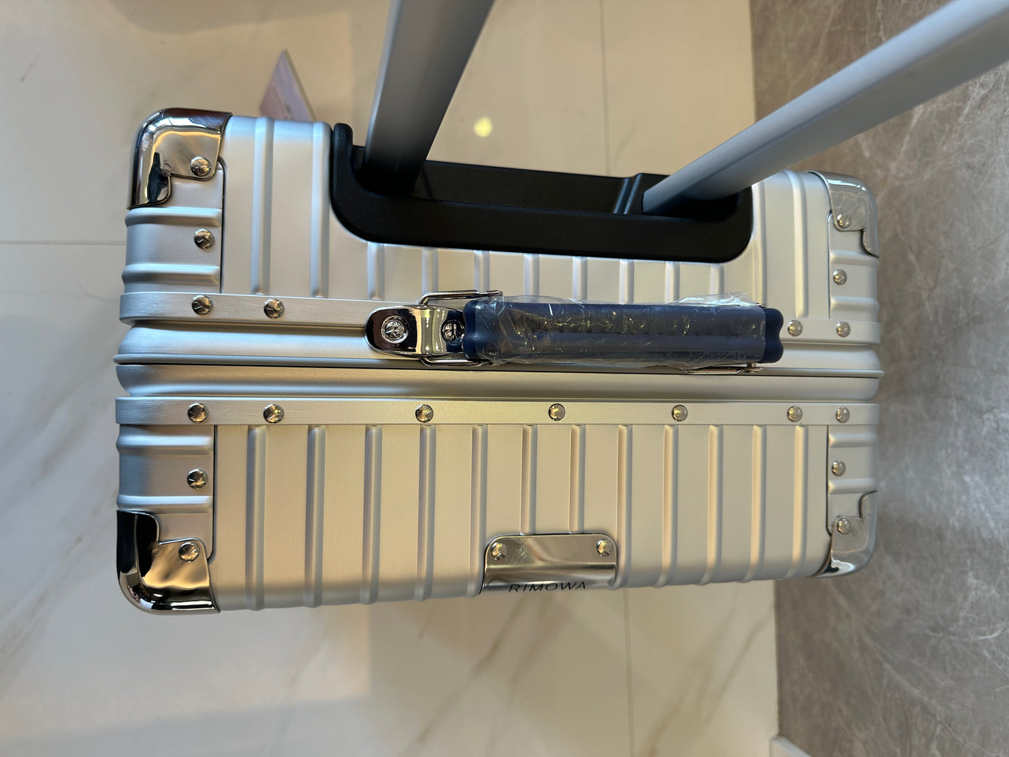 RIMOWA Silver Spinner Suitcase with TSA Lock