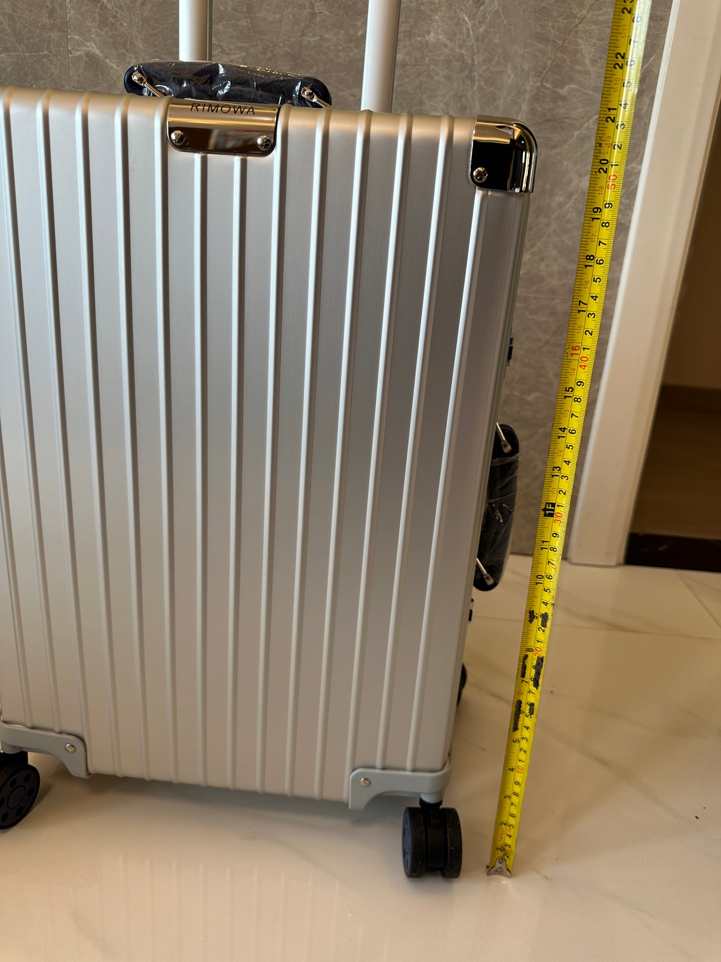 RIMOWA Silver Spinner Suitcase with TSA Lock