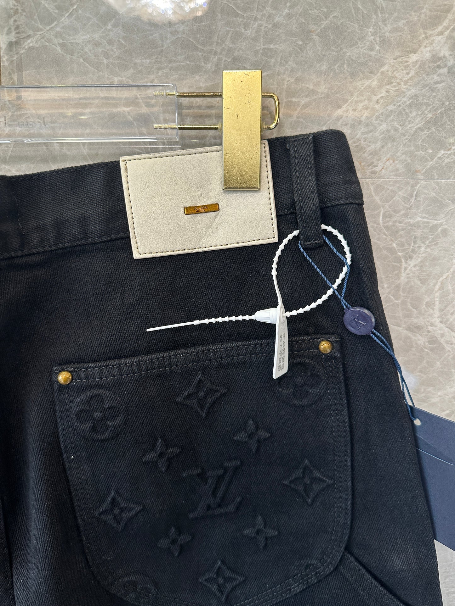 Louis Vuitton Monogram Embossed Denim Shorts in Black