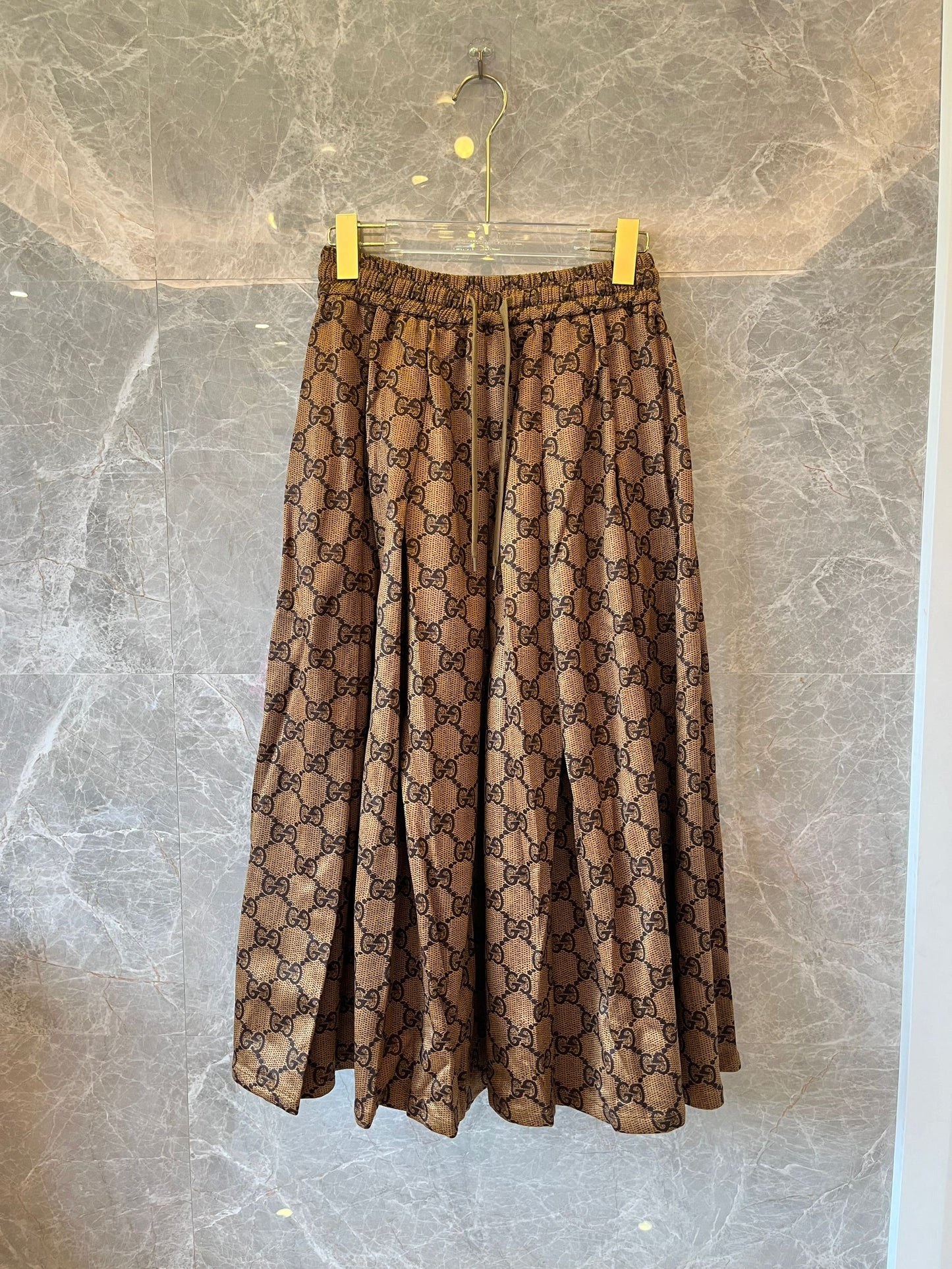 Jupe midi plissée imprimée GG Interlocking Supreme Gucci