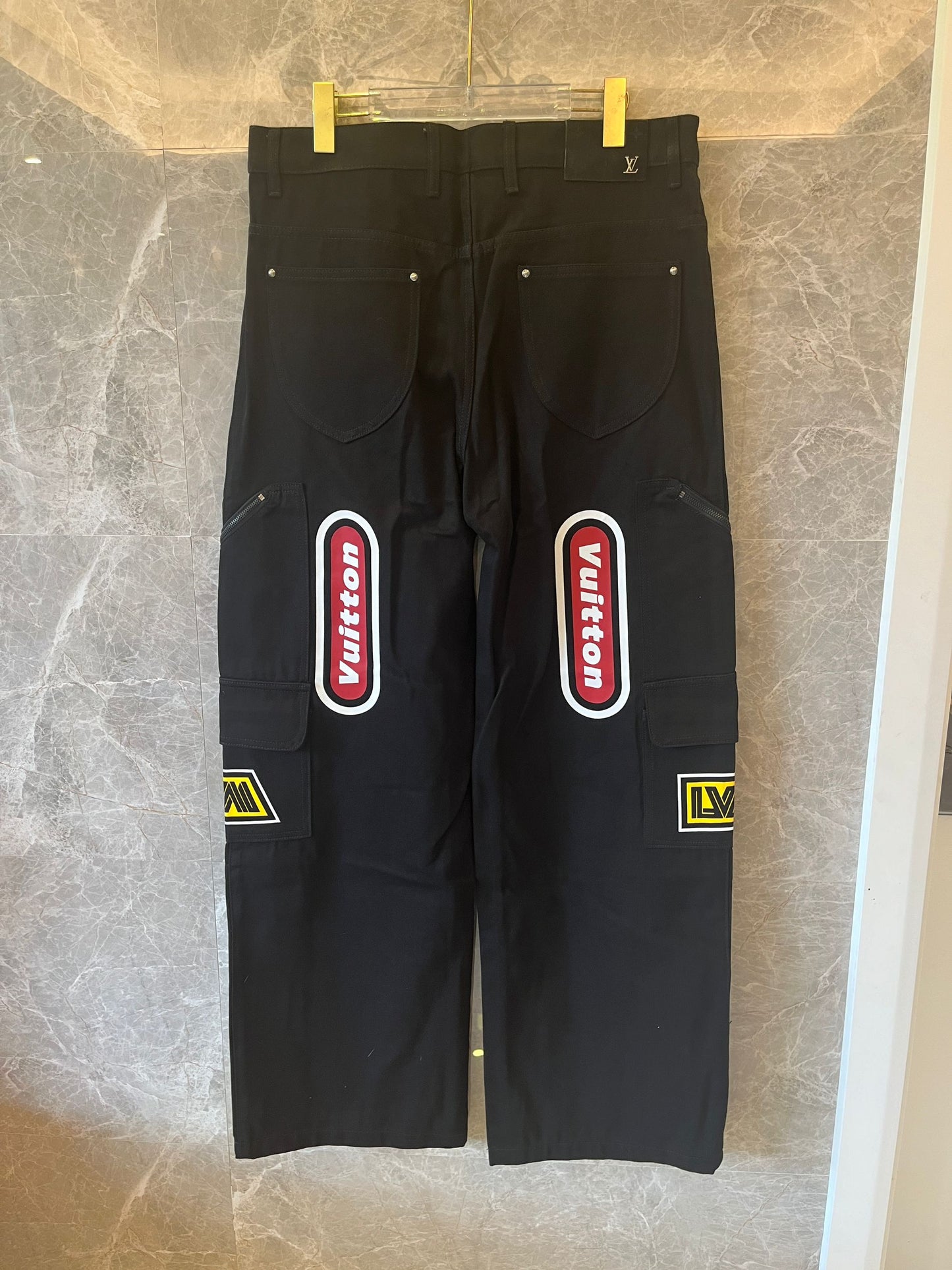Calça jeans estampada de corrida Louis Vuitton