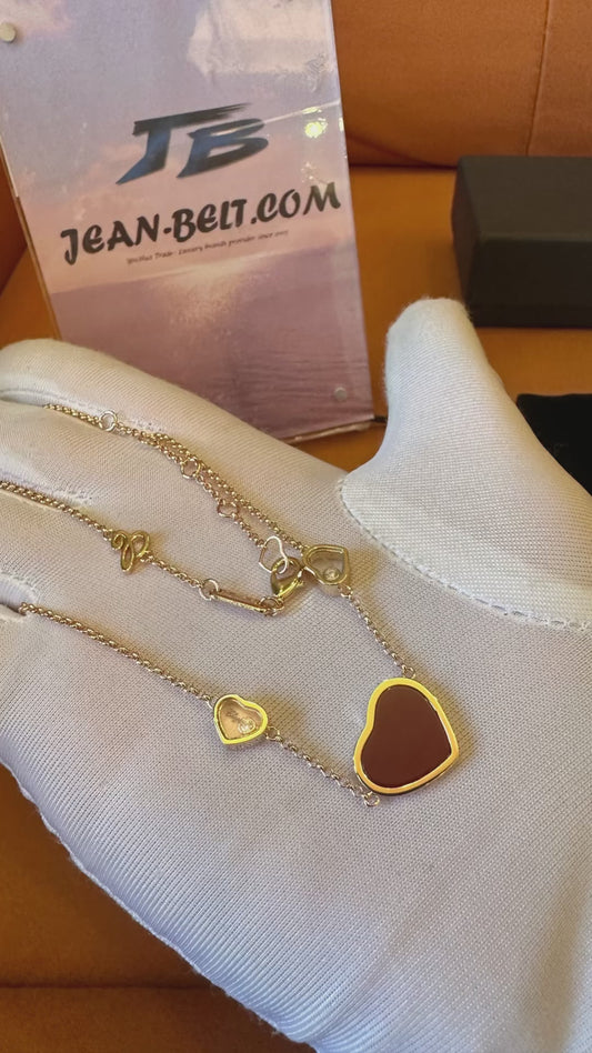 Collar Chopard corazones rojos oro rosa
